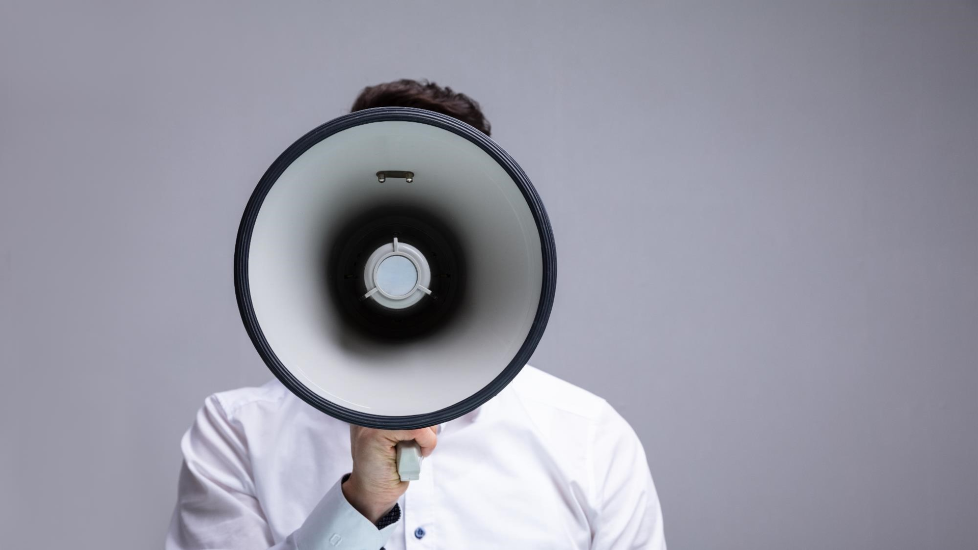 Image of person speaking in a megaphone